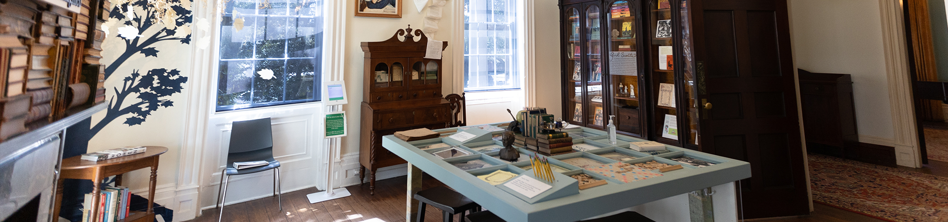  The library inside the Juliette Gordon Low Birthplace with educational games on display in the middle. 